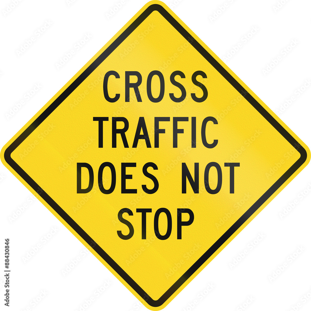 Warning road sign in Canada - Cross traffic does not stop. This sign is used in Ontario Warning road sign in Canada - Cross traffic does not stop. This sign is used in Ontario