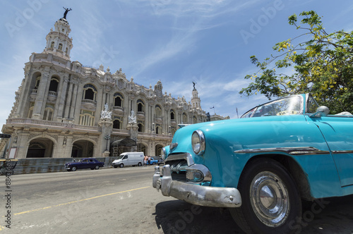 Blue classic car in front of the National Theatre in Havana, Cuba. © Roberto Lusso