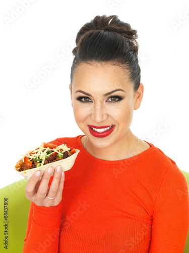 Beautiful Young Hispanic Woman With Chilli Beef Tacos and Melted Cheese