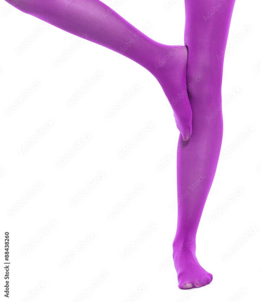 Woman slim legs and violet stockings isolated