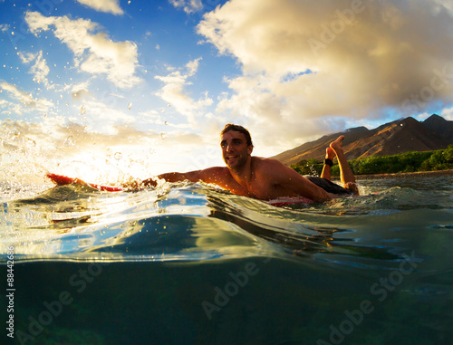 Surfing at Sunset © EpicStockMedia