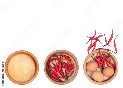 cooking set with chilli and egg on white background