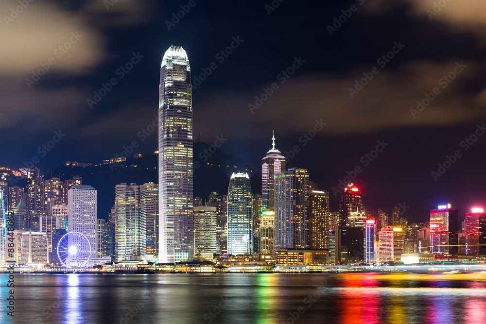 Hong Kong Victoria Harbour cityscape at night.