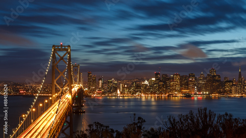 San Francisco skyline and bay bridge at night