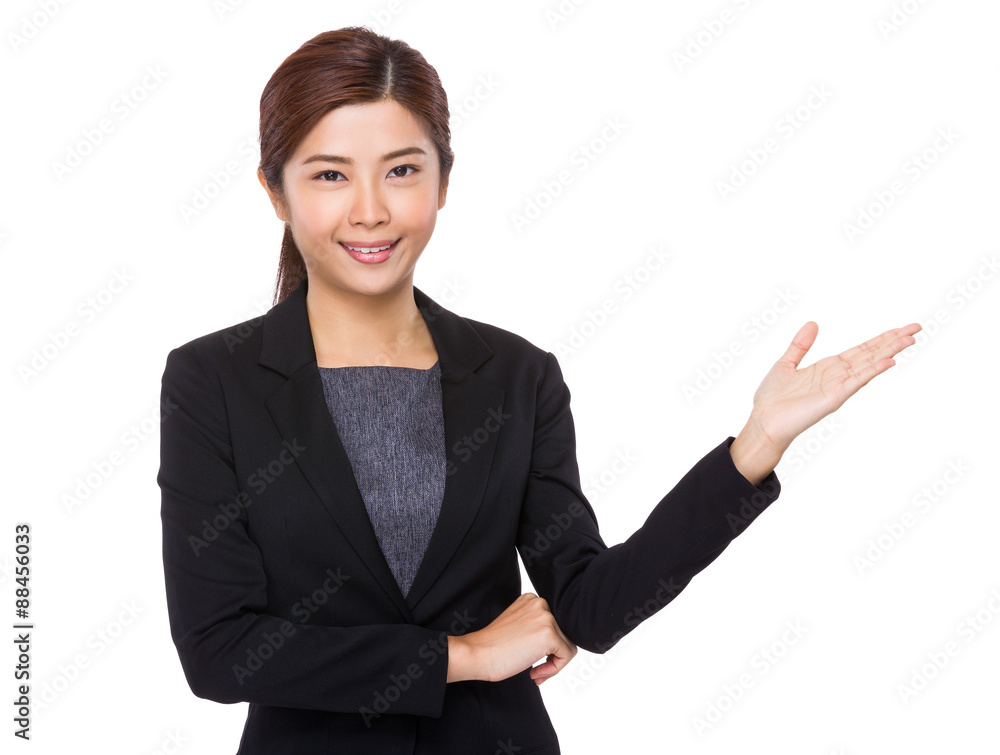 Young businesswoman with hand showing blank sign Young businesswoman with hand showing blank sign