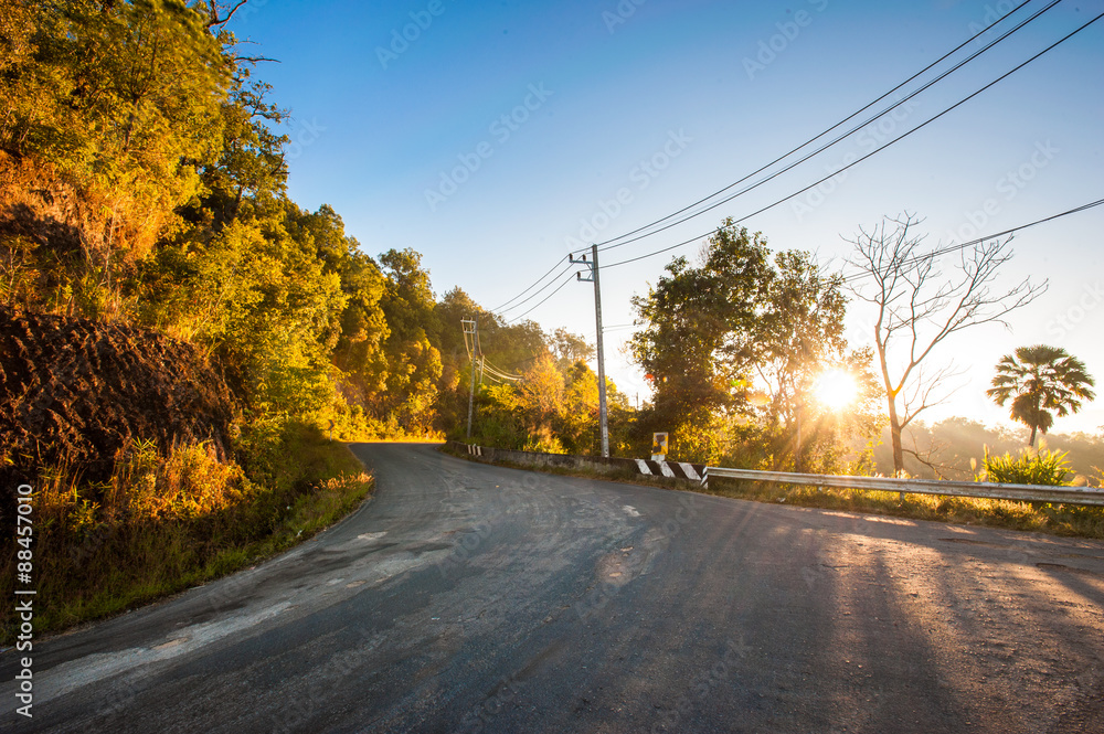 Mountain road at sunset