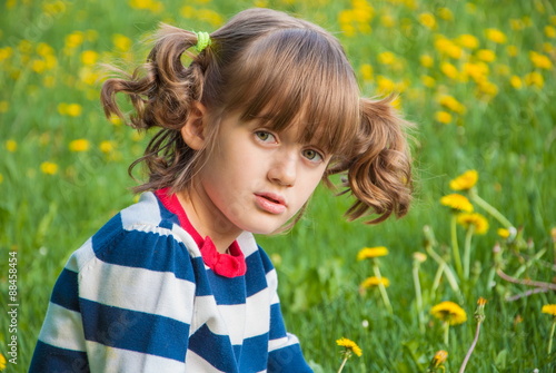 Fotografie Little girl with a surprised expression on his face
