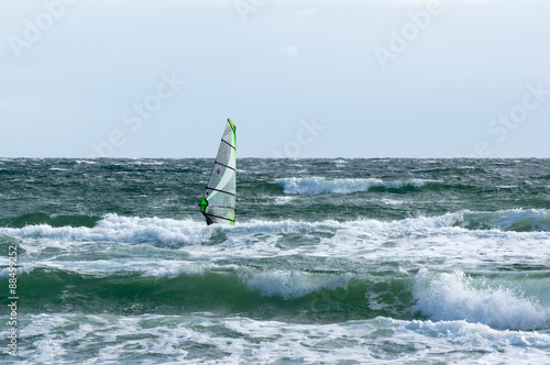 Windsurfer on a stormy sea