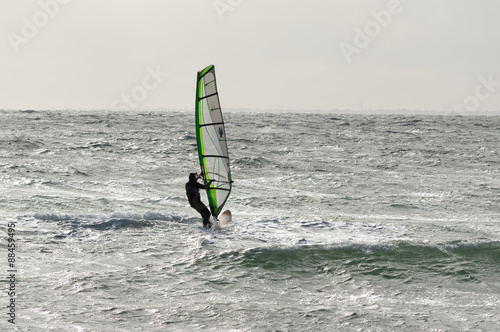 Windurfer on a leadan sea