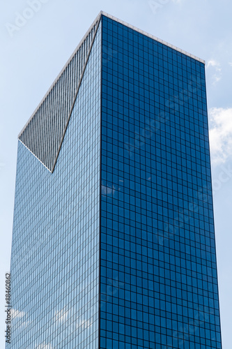 Clouds Reflected in Blue Tower wtih Triangle Design