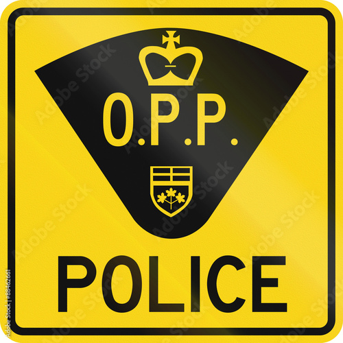 An Canadian traffic sign - Police station. This sign is used in Ontario photo