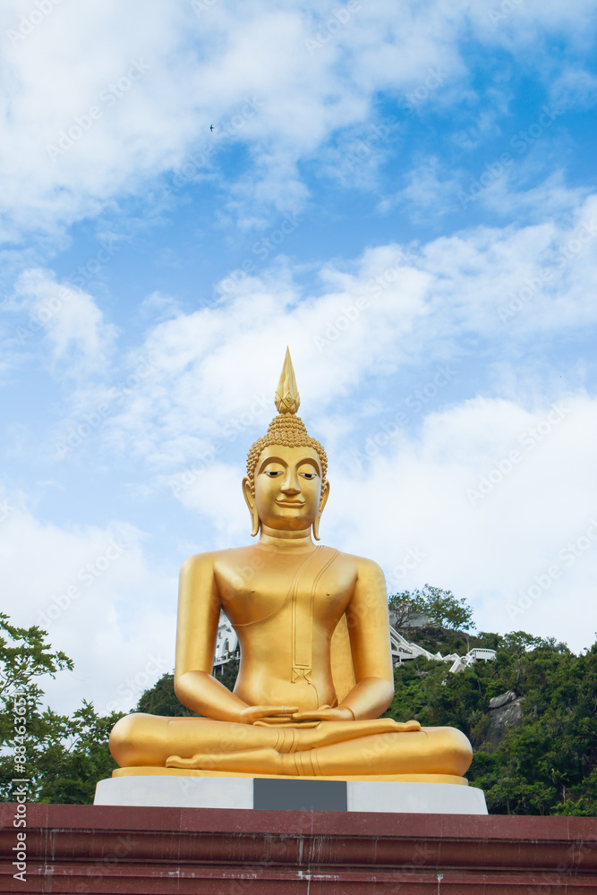This is Gold Buddha statue in the asian temple, With sky background. This is Gold Buddha statue in the asian temple, With sky background.