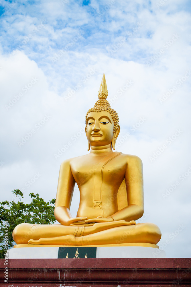 This is Gold Buddha statue in the asian temple, With sky background. This is Gold Buddha statue in the asian temple, With sky background.