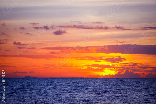 amazing sunset over beautiful sky with clouds, rippling waters