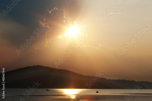 Fototapeta Naklejka Na Ścianę i Meble -  sunset lake and boats