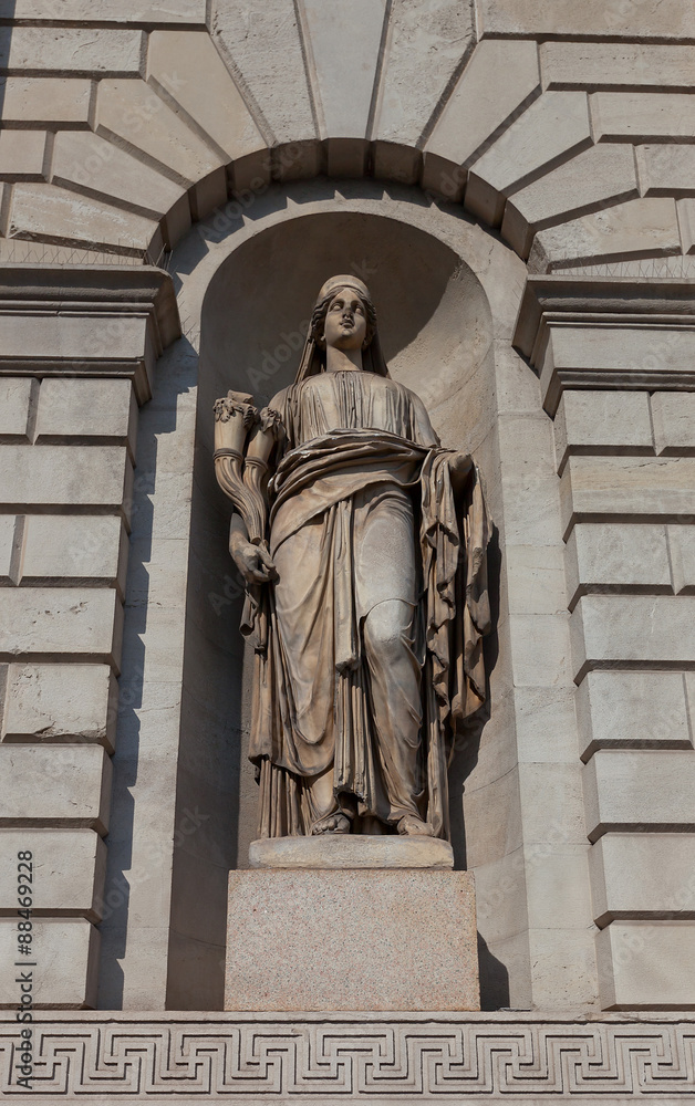 Fototapeta premium Wealth Statue (XIX c.) of Porta Venezia gates in Milan, Italy