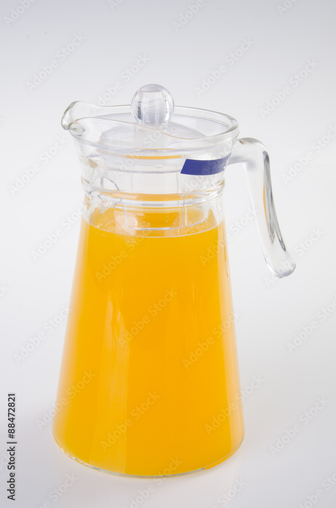 Orange juice in jar. on background Orange juice in jar. on background