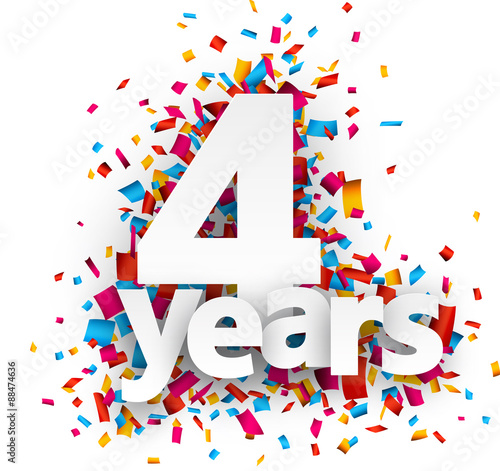 Four years paper confetti sign.