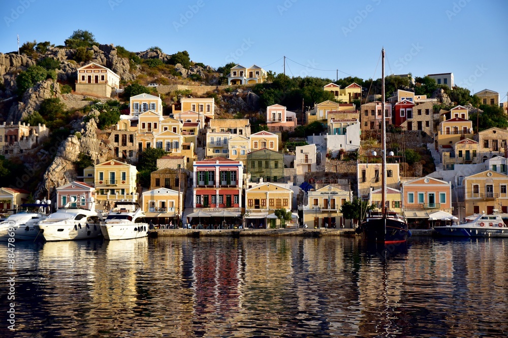 Boats moored in Symi Island harbour Greece