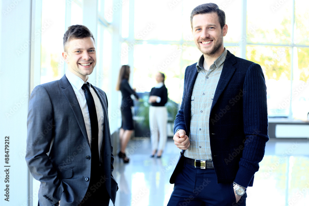 Happy business people talking on meeting at office Happy business people talking on meeting at office