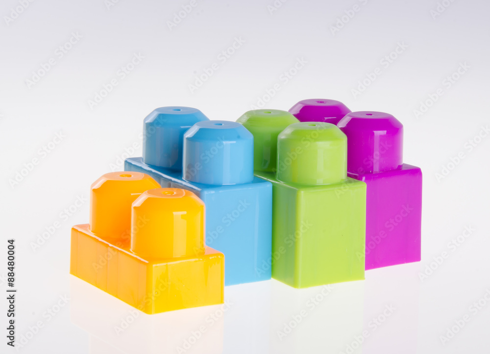 Plastic building blocks on background Plastic building blocks on background