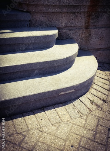 Sunlit stone stairs with shadow photo