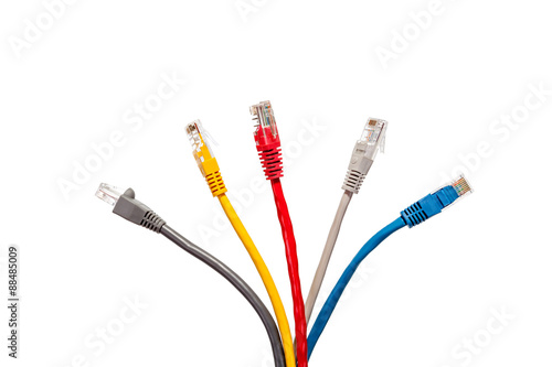 Multicolored network cables in the form of a fan on a white background