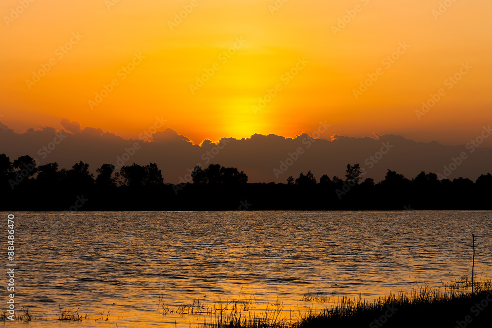 Obraz premium beautiful sunset on the river