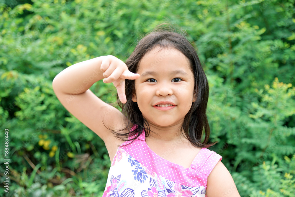 Outdoor Portrait of a Smiling Little Girl