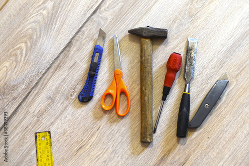 tools on a wooden floor © pavasaris