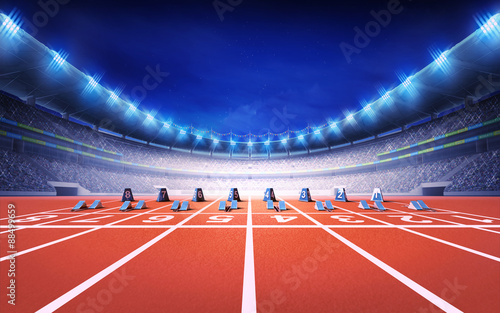athletics stadium with race track with starting blocks front view photo