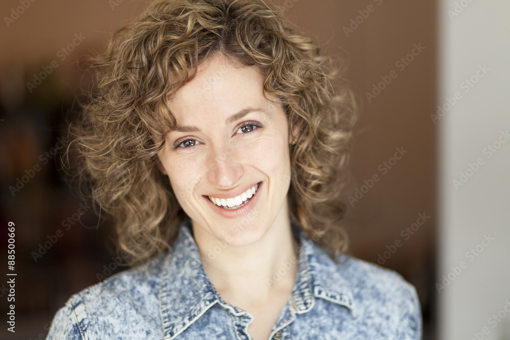 Closeup of a woman smiling at the camera Closeup of a woman smiling at the camera