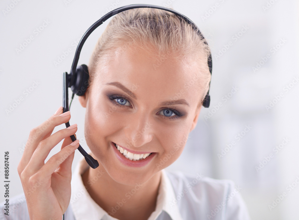 Close-up portrait of a customer service agent sitting at office Close-up portrait of a customer service agent sitting at office
