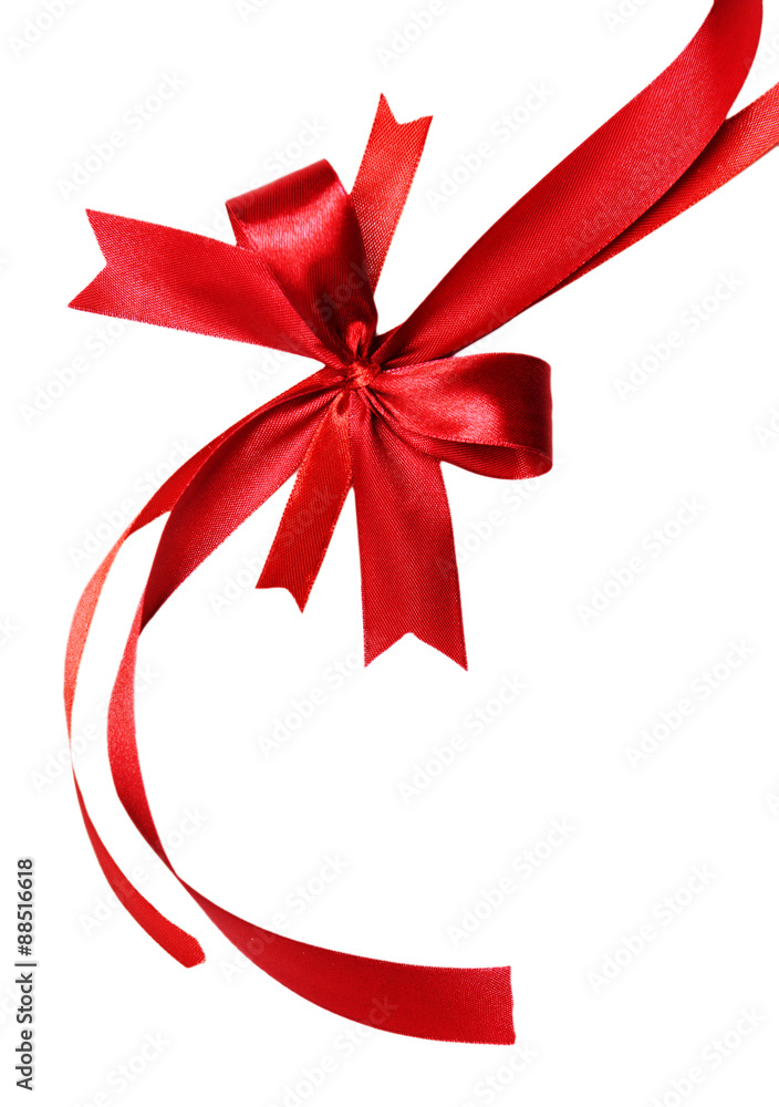 Shiny red ribbon with bow isolated on white Shiny red ribbon with bow isolated on white