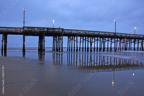 Beach pier on a foggy California morning © kgrif