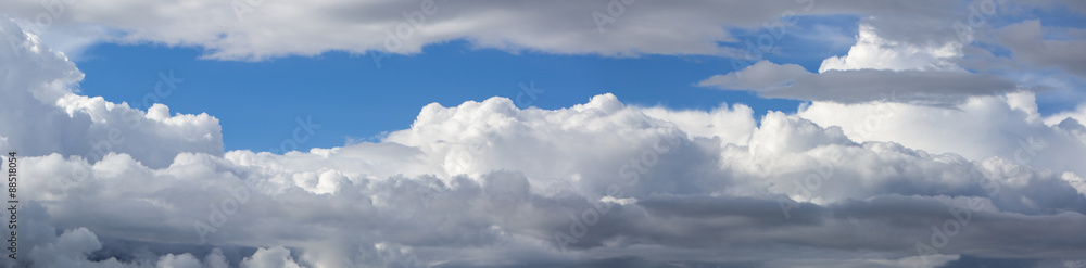 Obraz premium Beautiful blue cloudy sky. Panoramic shot.