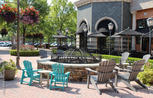 Cast stone fire pit with a protective cover in a public area, Short Pump Town Center, Virginia, USA