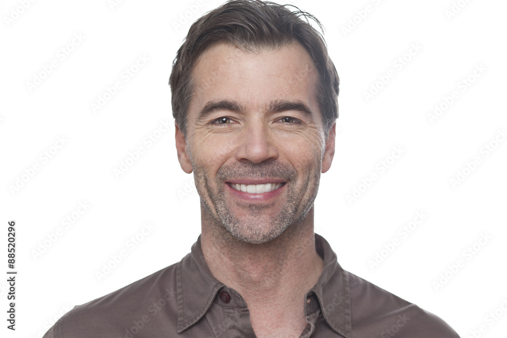Obraz premium Portrait Of A Mature Man Smiling At The Camera Isolated On White