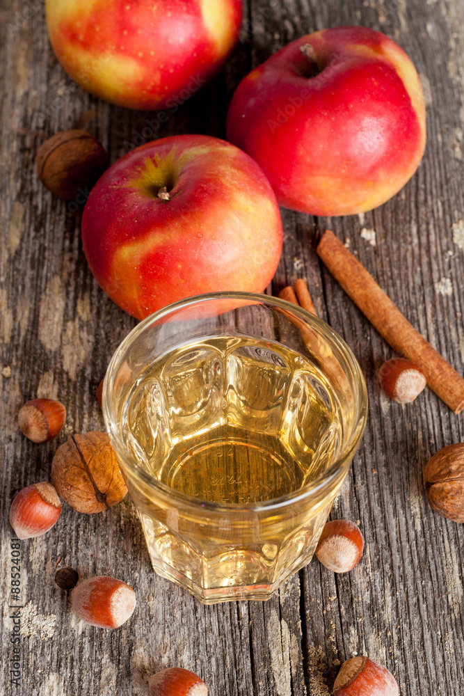 apple cider or juice in a glass, close-up