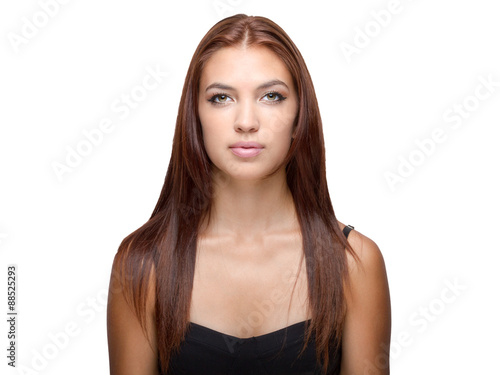 Head shot of female holding head scarf