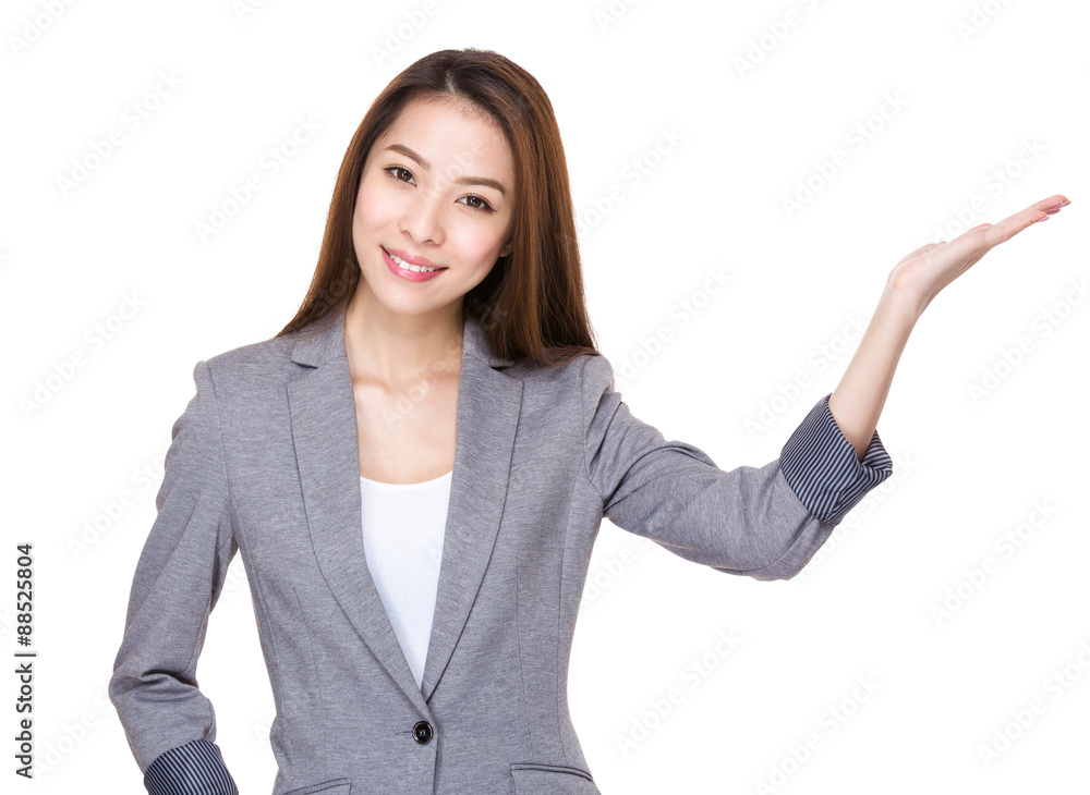 Asian young businesswoman with open hand palm Asian young businesswoman with open hand palm