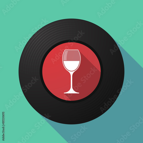 Vinyl record with a cup of wine