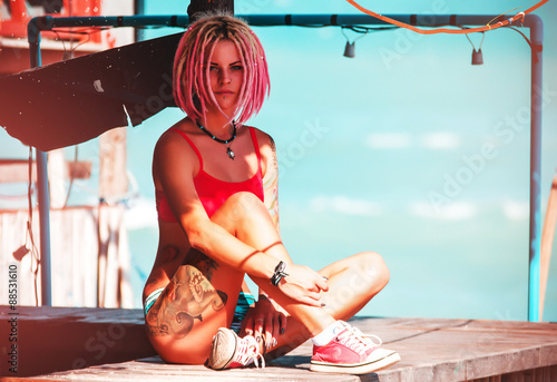 beautiful girl frick with pink dreadlocks photo