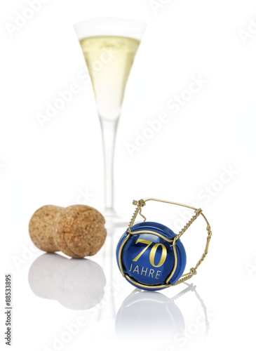 Champagnerdeckel mit der Aufschrift 70 Jahre photo