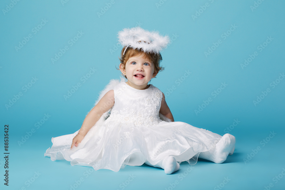 little angel on blue background little angel on blue background