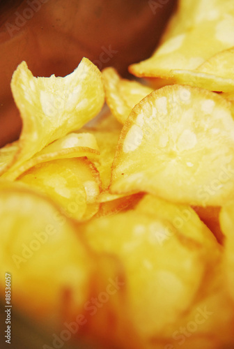 Yellow fried cassava - extreme closeup view.
