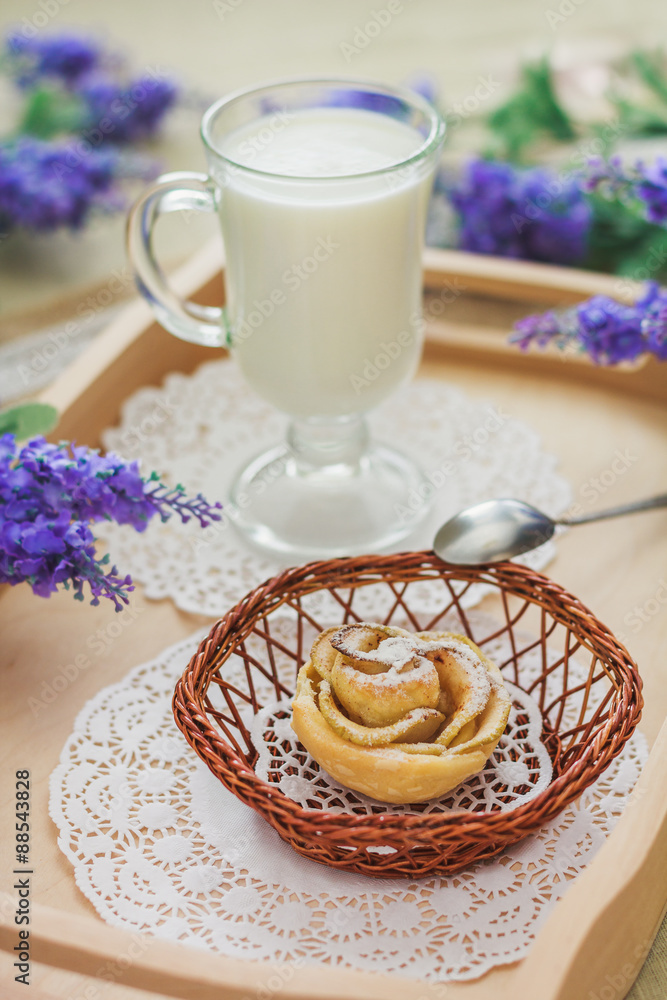 Tasty homemade apple cakes over wooden background Tasty homemade apple cakes over wooden background