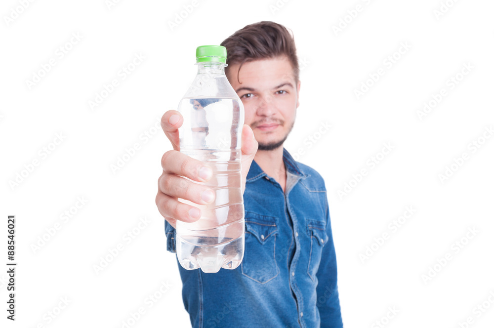 Man showing plastic bottle with cold water Man showing plastic bottle with cold water