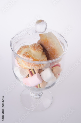 Candies. colorful candies in glass jar on background