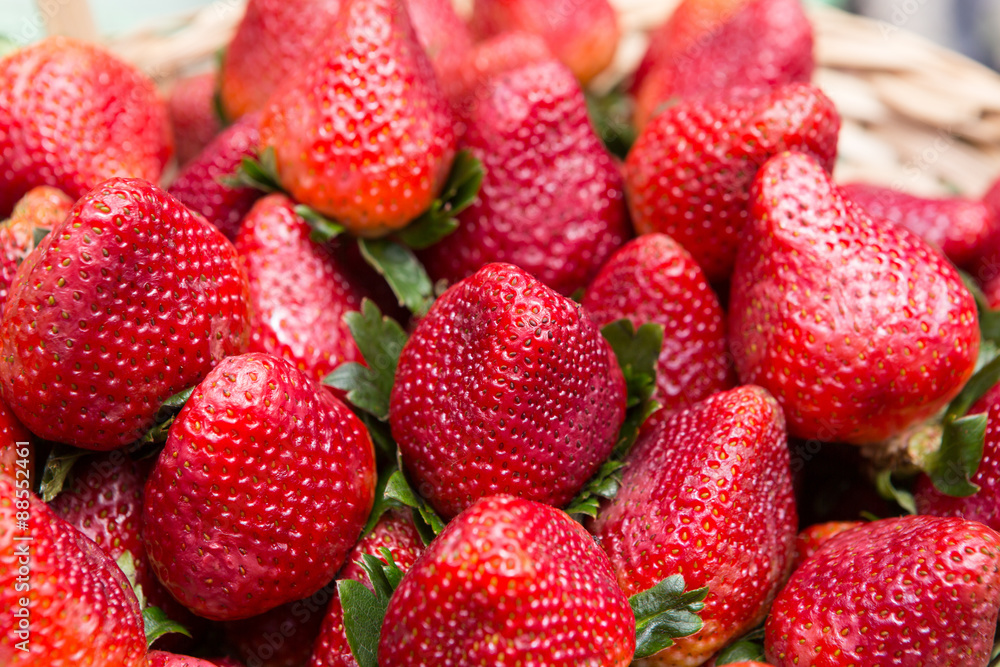 Sweet ripe strawberries in wicker basket Sweet ripe strawberries in wicker basket